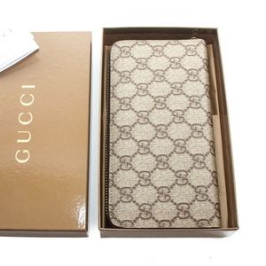 GUCCI GG MONOGRAM ZIPPY WALLET
